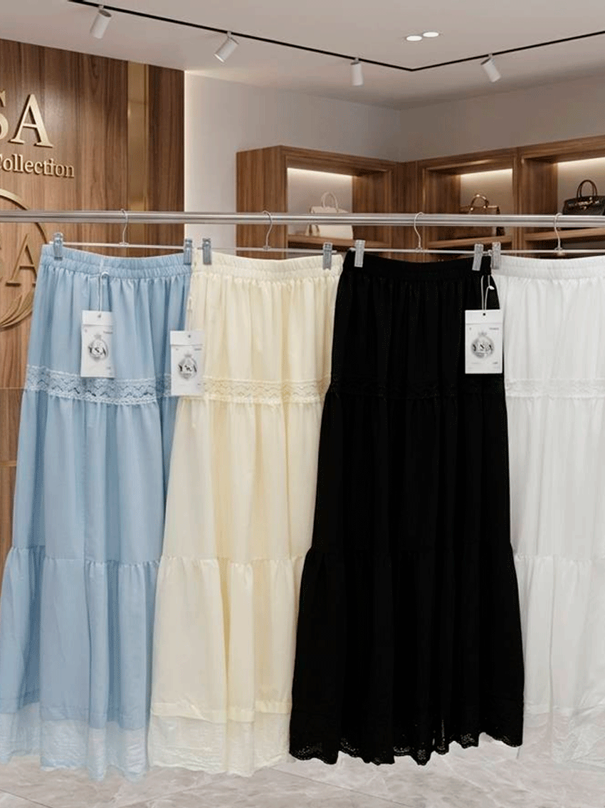 Ayollar uchun oq maxi yubka – yozgi yengil model b3b7q537d